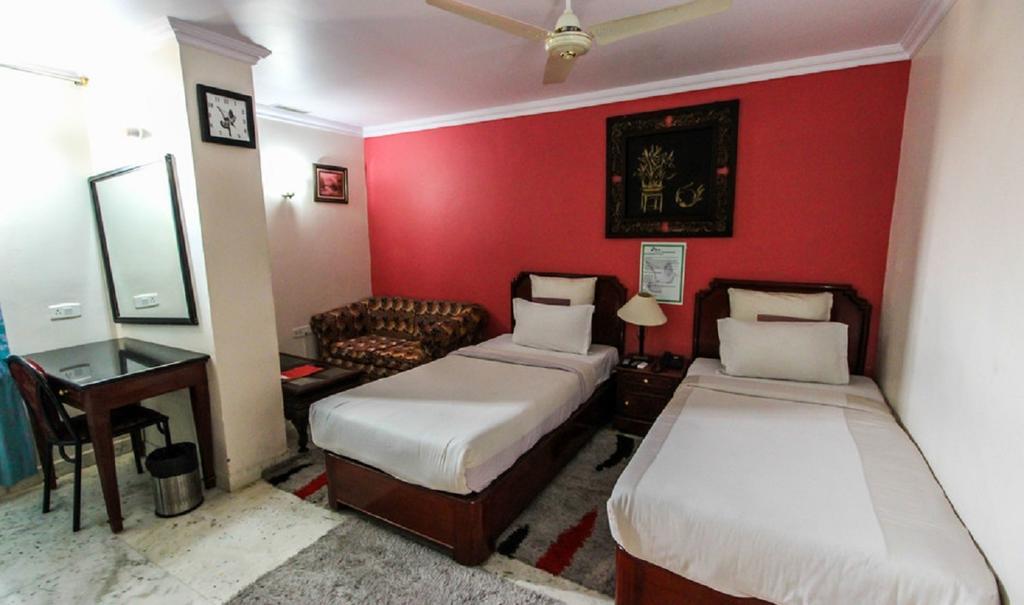 Hotel Pigeon International Bengalúr Pokoj fotografie